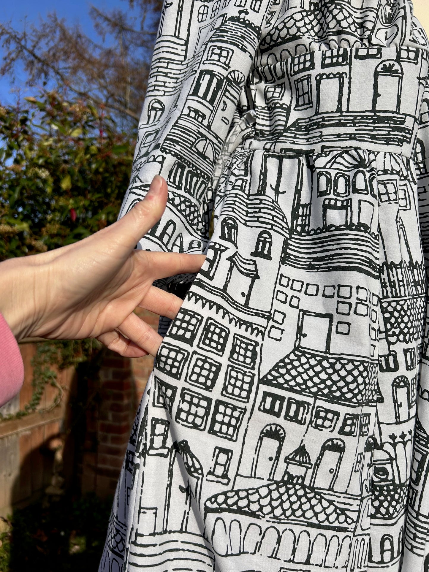 The Ronnie Wrap dress - linear building print